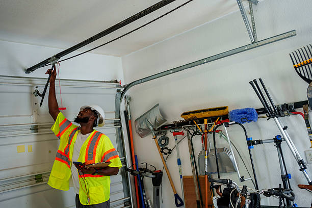 Professional Garage Door Repair technician working in Southport, IN